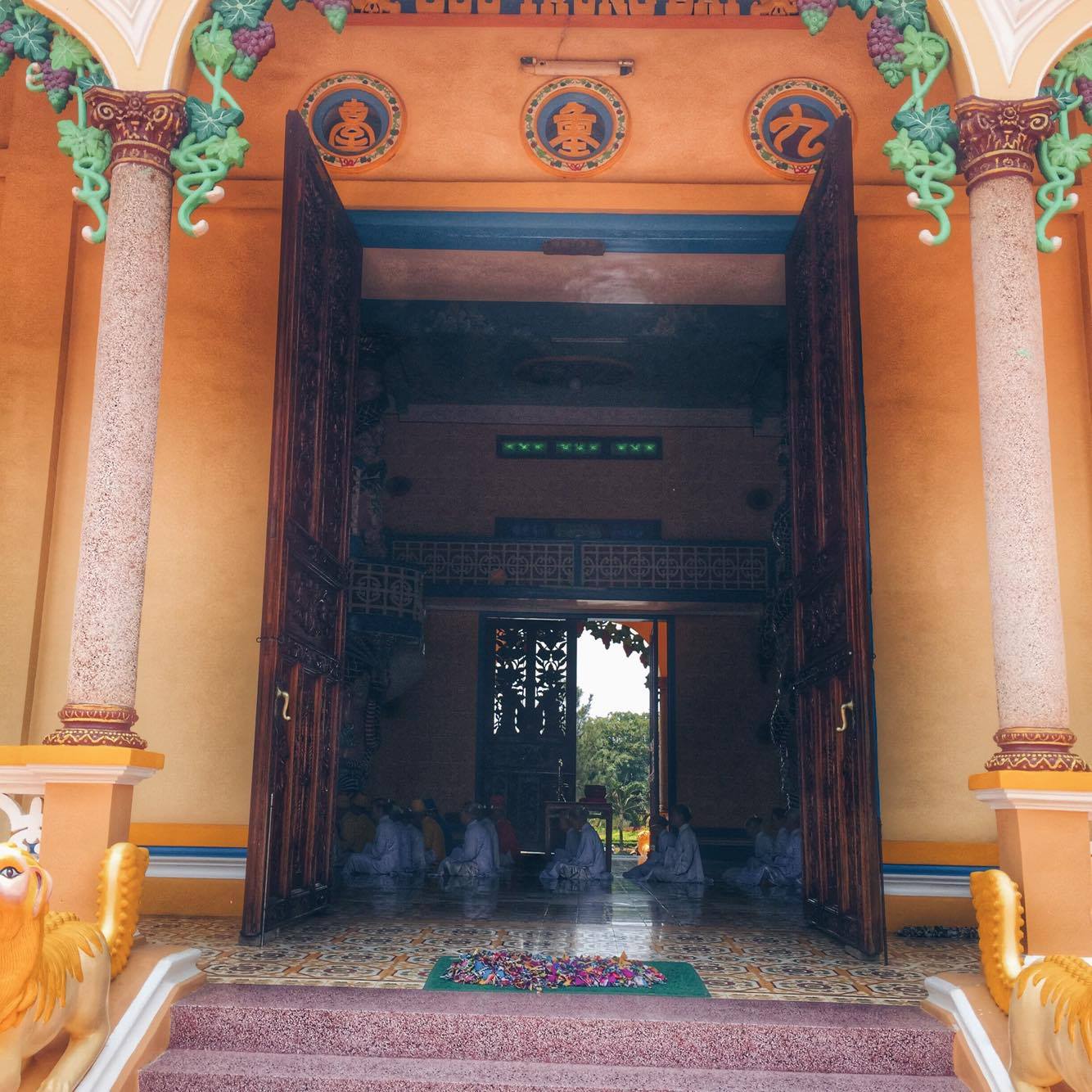 cao dai temple worshippers 12noon service