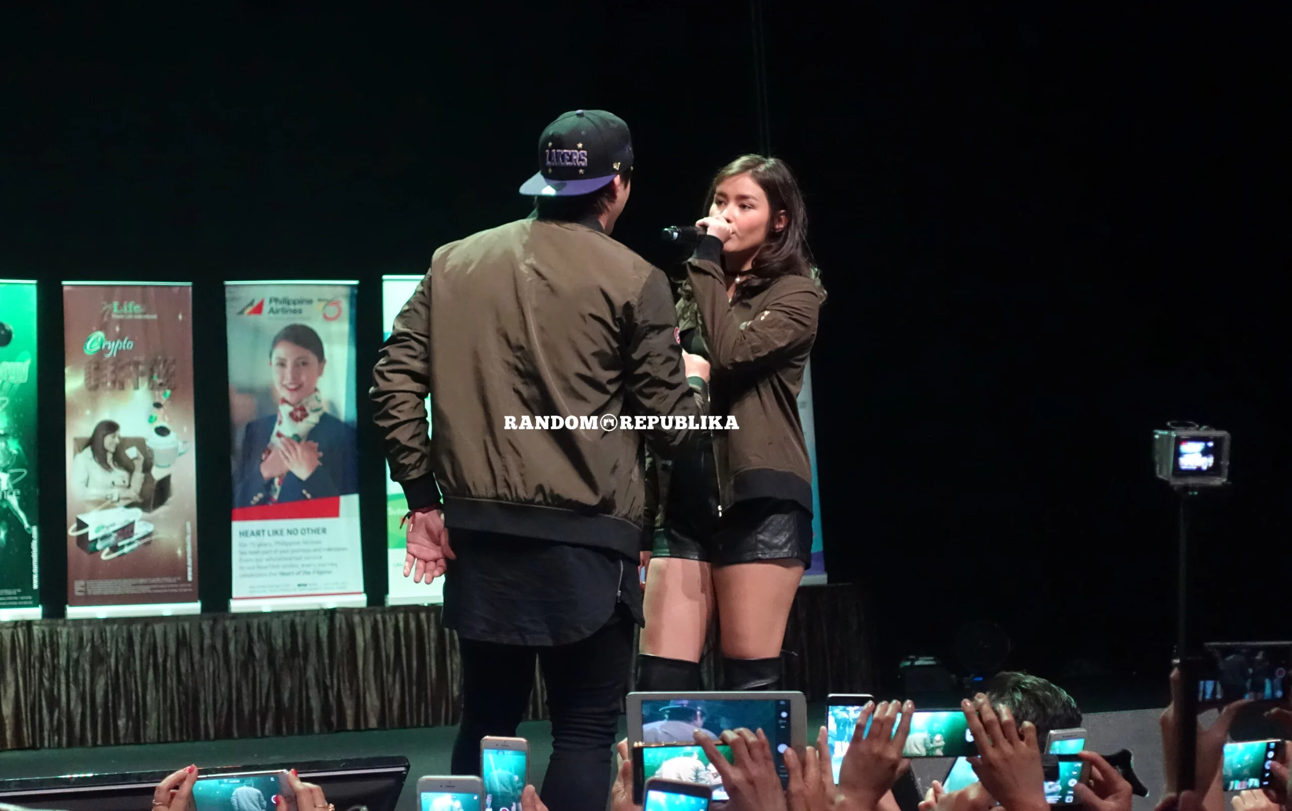 singing at LizQuen LIVE in Singapore 2016