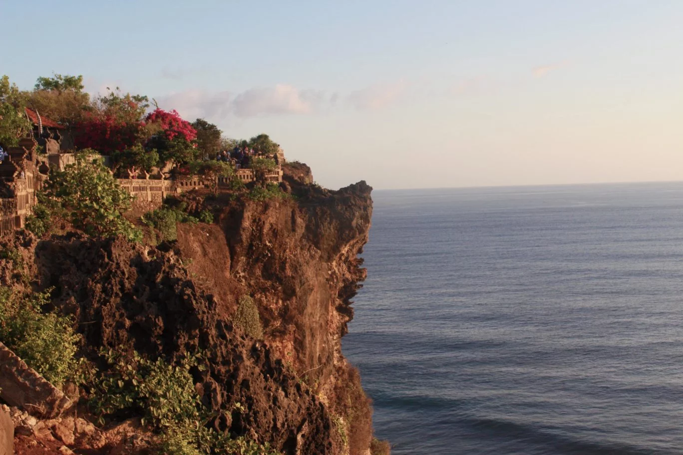 uluwatu temple at sunset in bali indonesia